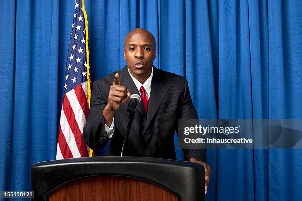 businessman pointing - politician speaking stock pictures, royalty-free photos & images