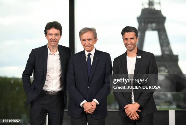 Of LVMH Holding Company, Antoine Arnault , World's top luxury group LVMH head Bernard Arnault and the President of the Paris 2024 Organising...