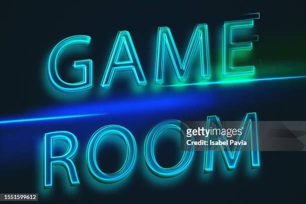 game room message in neon lights - joystick stock-fotos und bilder