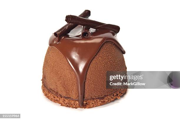 chocolate mousse bomb desert over a white background - chocolade mousse stockfoto's en -beelden
