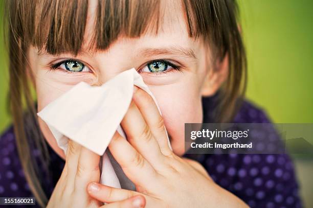 having fun cleaning nose - handkerchief 個照片及圖片檔