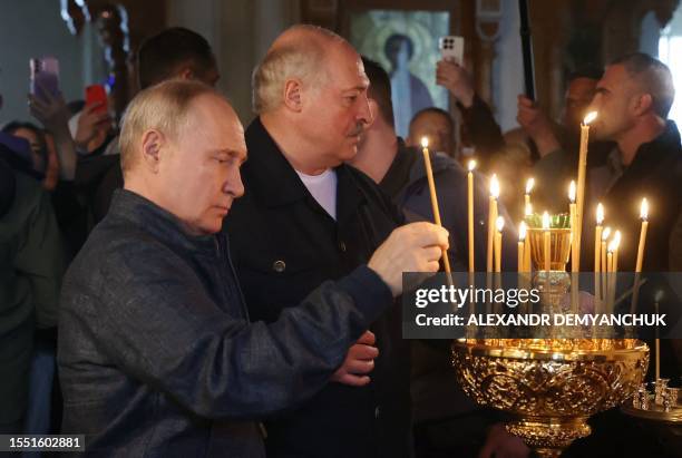 Russian President Vladimir Putin and his Belarus' counterpart Alexander Lukashenko visit the Valaam Monastery on Valaam island in the northern...