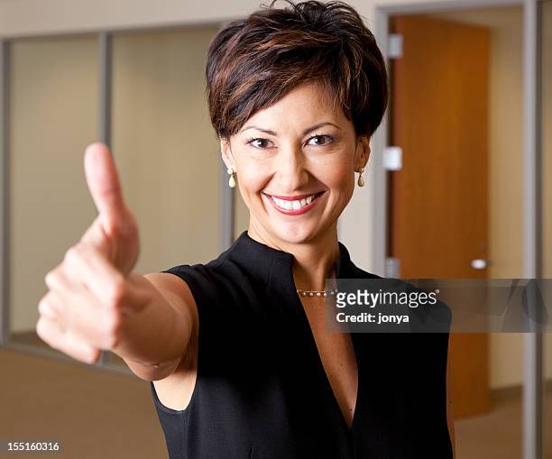 thumbs up - pearl earring stock pictures, royalty-free photos & images