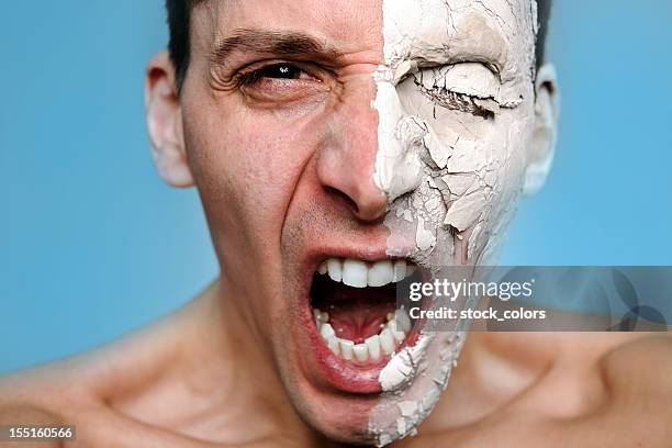 angry man - mask irritation stock pictures, royalty-free photos & images