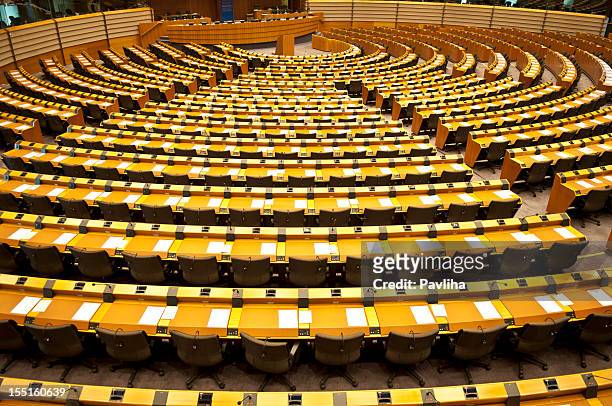 european parliament empty assembly room brussels - european parliament stock pictures, royalty-free photos & images