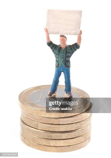 males with poster on euro coins - beeldje stockfoto's en -beelden