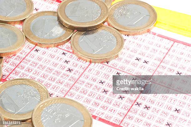 lotto - lottery ticket with coins - win tickets stock pictures, royalty-free photos & images