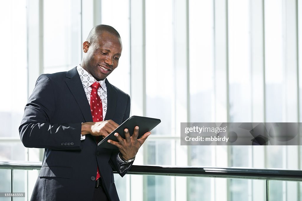 Businessman using digital tablet