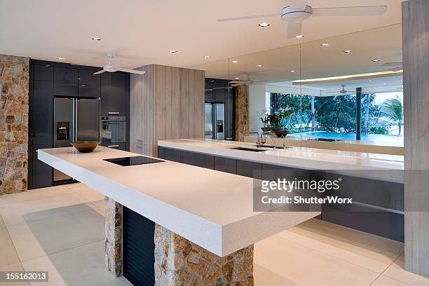 modern villa kitchen - luxury mansion interior stock pictures, royalty-free photos & images