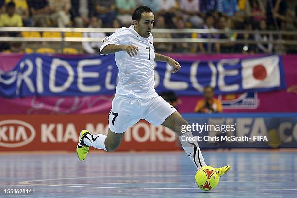 Reda Fathe of Libya makes a break against Portugal during the FIFA Futsal World Cup, Group C match between Libya and Portugal at Korat Chatchai Hall...