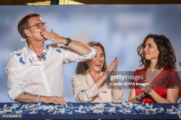 Alberto Nuñez Feijoo, candidate for the presidency for the Popular Party, addresses his supporters from the balcony of his party's headquarters....