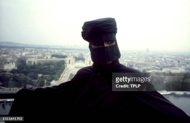 Jamaican-American model Grace Jones, is May Day dressed in costume on the Eiffel Tower during the filming of the 1985 James Bond spy movie, A View to...