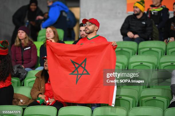 Moroccan fan is seen with a national flag during the FIFA Women's World Cup 2023 match between Germany and Morocco at the Melbourne Rectangular...