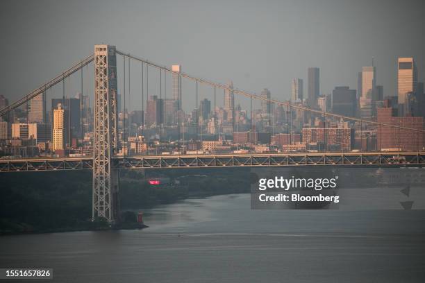 Vehicles cross the George Washington Bridge from Fort Lee, New Jersey, US, on Monday, July 24, 2023. New York's plan to charge drivers entering...