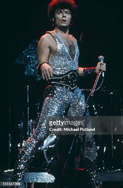 English pop singer Gary Glitter performing on stage, circa 1975.
