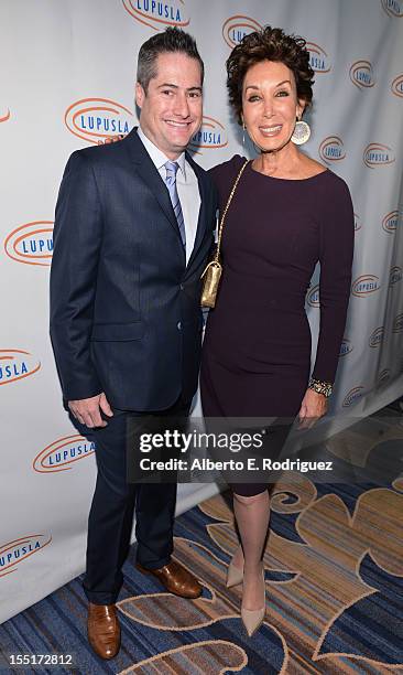 Lupus LA Chairman Adam Selkowitz and publicist Carrie Brillstein arrive to the Lupus LA 10th Anniversary Hollywood Bag Ladies Luncheon at Regent...