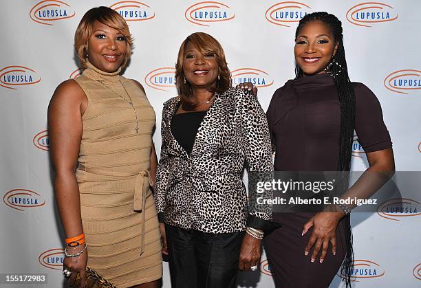 Traci Braxton, Evelyn Braxton and Trina Braxton arrive to the Lupus LA 10th Anniversary Hollywood Bag Ladies Luncheon at Regent Beverly Wilshire...