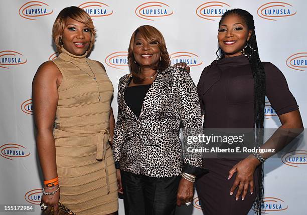 Traci Braxton, Evelyn Braxton and Trina Braxton arrive to the Lupus LA 10th Anniversary Hollywood Bag Ladies Luncheon at Regent Beverly Wilshire...