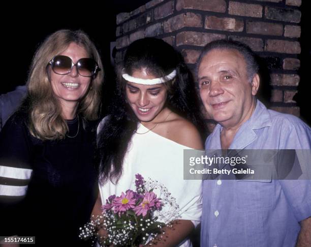 Athlete Jake LaMotta, wife Vicki LaMotta and daughter Stephanie LaMotta sighted on July 29, 1983 at Tony Roma's Restaurant in New York City.