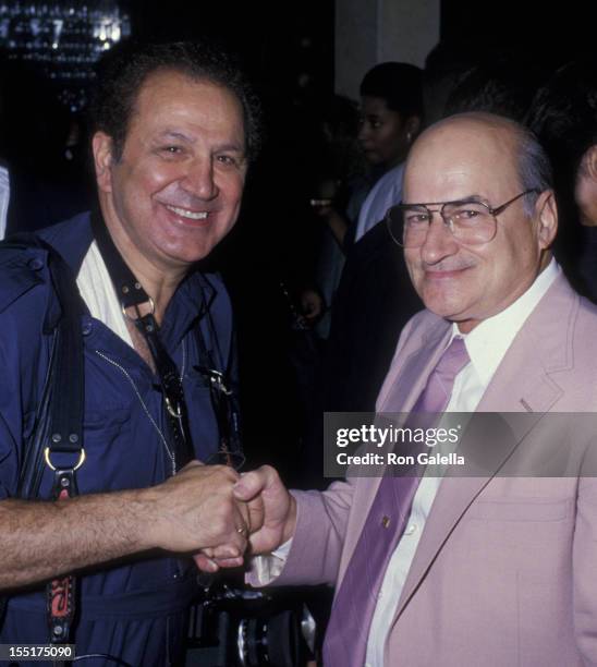 Ron Galella and John Warhola attend the launch party for "Andy Warhol's Party Book" on August 24, 1988 at Club MK in New York City.