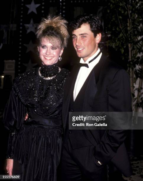 Singer Olivia Newton-John and husband Matt Lattanzi attend the 13th Annual American Film Institute Lifetime Achievement Award Salute to Gene Kelly on...