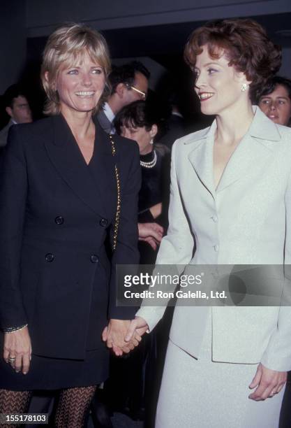 Cheryl Tiegs and actress Sigourney Weaver attend the premiere of "Death And The Maiden" on December 5, 1994 at the Sony Lincoln Square Theater in New...