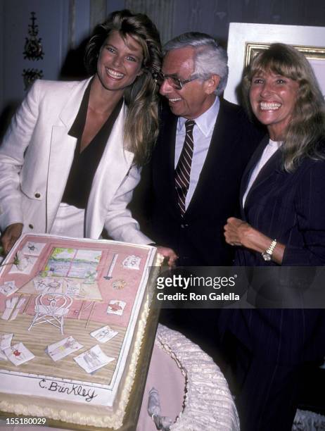 Model Christie Brinkley, Russ Rogs, Inc. Executive Harvey Rosenzweig and Christie Brinkley's mom Marge Brinkley attend the press luncheon to announce...