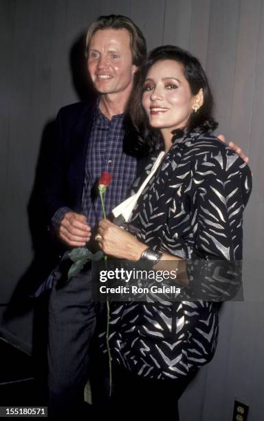 Actor Jon Voight and Barbara Carrera attend Welcome Home Vets Benefit on February 24, 1986 at the Forum in Los Angeles, California.