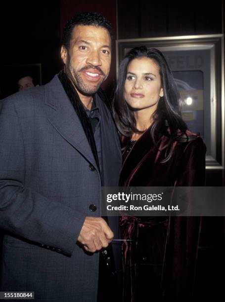 Musician Lionel Richie and Diane Alexander attend the premiere of "The Preacher's Wife" on December 9, 1996 at the Ziegfeld Theater in New York City.