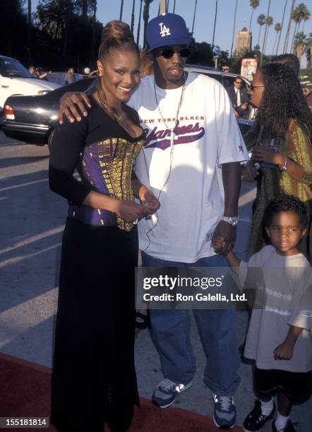 Singer Janet Jackson, hip-hop star Sean "Puffy" Combs and son Justin Bombs attend the 1999 Source Hip-Hop Music Awards on August 18, 1999 at the...