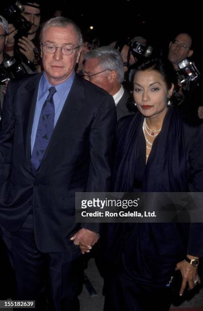 Actor Michael Caine and wife Shakira Caine attend the premiere of "Life Is Beautiful" on October 20, 1998 at the Gotham Theater in New York City.
