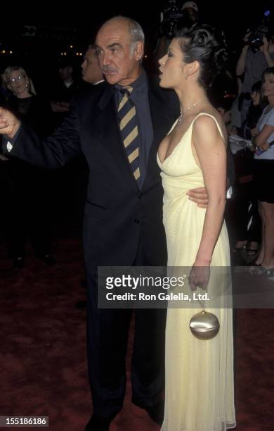 Actor Sean Connery and actress Catherine Zeta-Jones attend the premiere of "Entrapment" on April 15, 1999 at Mann Chinese Theater in Hollywood,...