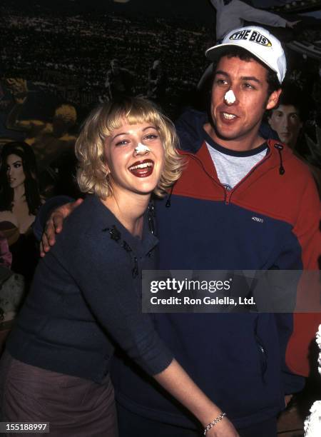 Actress Drew Barrymore and comedian Adam Sandler attend "The Wedding Singer" Memorabilias Donated to Planet Hollywood on February 5, 1998 at Planet...