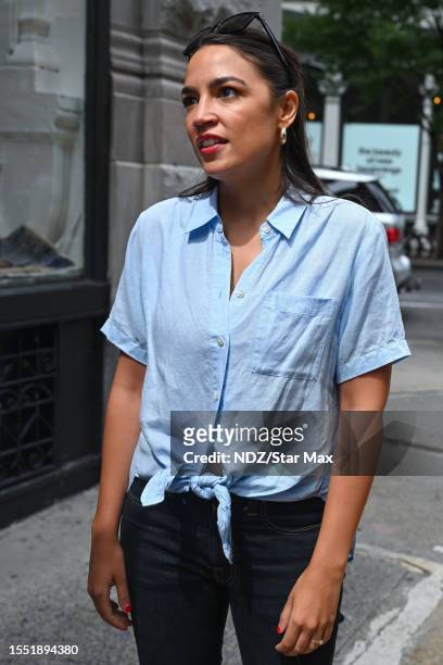 Alexandria Ocasio-Cortez walks the picket line in support of the SAG-AFTRA and WGA strike on July 24, 2023 in New York City.