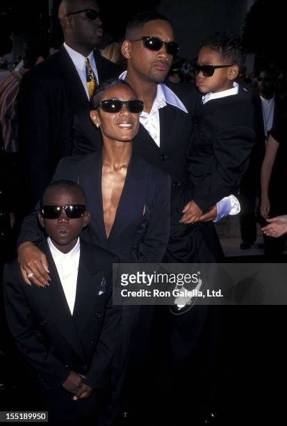 Actress Jada Pinkett, actor Will Smith, son Trey Smith and nephew attend the "Men in Black" Hollywood Premiere on June 25, 1997 at Pacific's Cinerama...