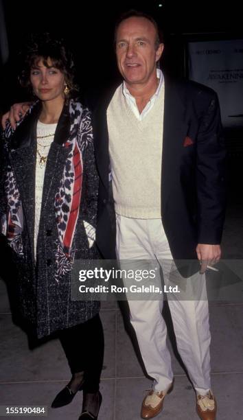 Actor James Caan and Ingrid Hajek attend the premiere of "Godfather III" on December 20, 1990 at the Academy Theater in Beverly Hills, California.