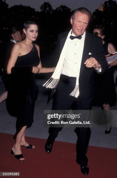 Actress Angelina Jolie and actor Jon Voight attend the premiere of "Fedora"on September 4, 1997 at the Dorothy Changler Pavilion in Los Angeles,...