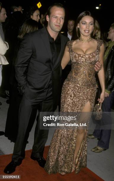 Actor Jason Statham and model Kelly Brook attend the premiere of "Snatch" on January 18, 2001 at the Director's Guild Theater in Hollywood,...