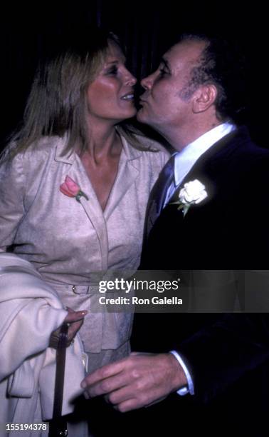 Actor Jake LaMotta and wife Vicki LaMotta attend the premiere of "Raging Bull" on November 13, 1980 at the Sutton Theater in New York City.