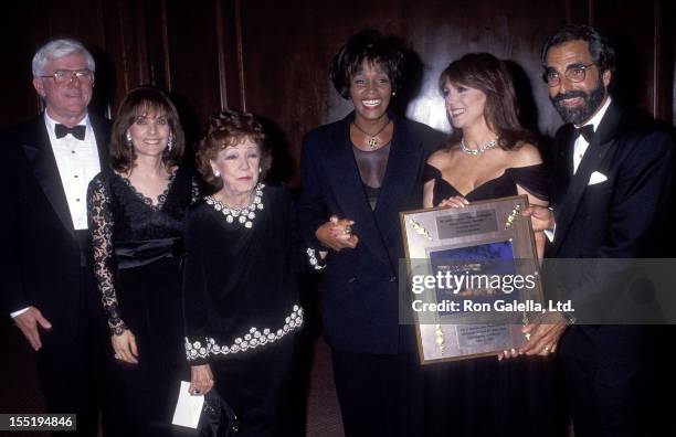 Talk show host Phil Donahue, Terre Thomas, Rose Marie Mantell, singer Whitney Houston, actress Marlo Thomas and producer Tony Thomas attend the 13th...