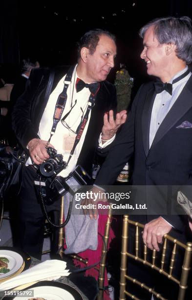Ron Galella and journalist Tom Brokaw attend Pavoratti-La Festa Romana Gala on January 9, 1989 at Lincoln Center in New York City.