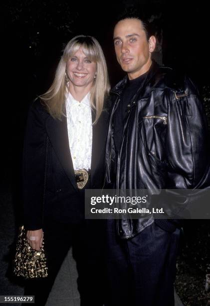 Singer Olivia Newton-John and husband Matt Lattanzi attend John Reid's 40th Birthday Party on September 9, 1989 in Beverly Hills, California.