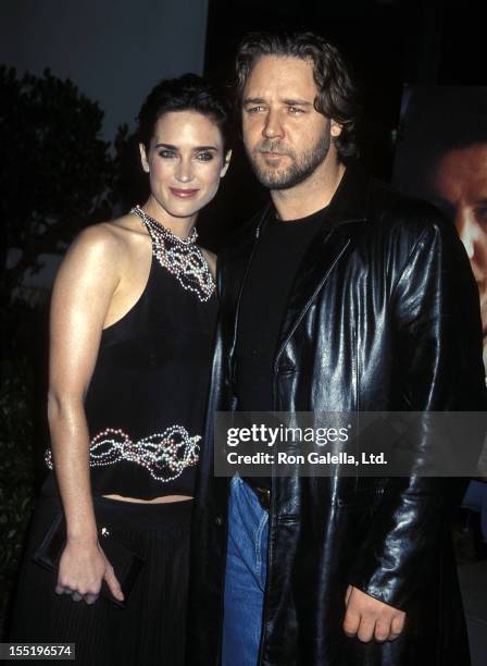 Actress Jennifer Connelly and actor Russell Crowe attend "A Beautiful Mind" Beverly Hills Premiere on December 13, 2001 at the Academy of Motion...