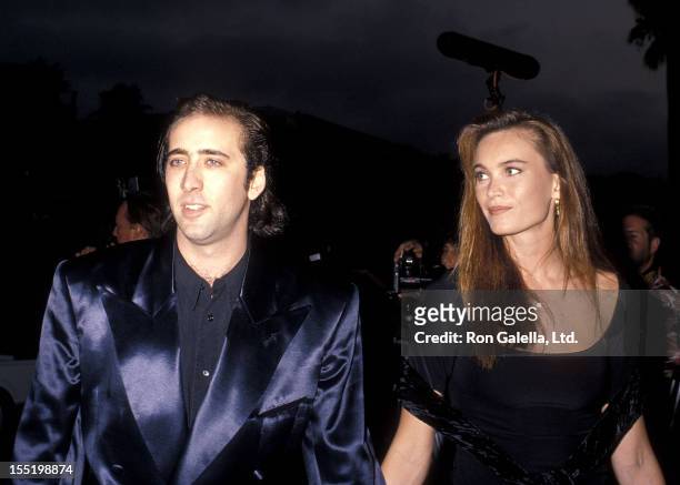 Actor Nicolas Cage and girlfriend Lisa Stothard attend the "Wild at Heart" Century City Premiere on August 13, 1990 at Cineplex Odeon Century Plaza...