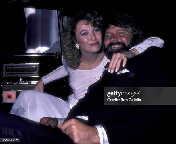 Musician Glen Campbell and Tanya Tucker attend Glen Campbell Golf Tournament Dinner Gala on February 17, 1981 at the Century Plaza Hotel in Century...