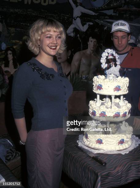 Actress Drew Barrymore and comedian Adam Sandler attend "The Wedding Singer" Memorabilias Donated to Planet Hollywood on February 5, 1998 at Planet...