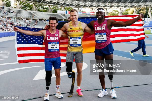 3rd position Jarryd Wallace of USA, 1st place Markus Rehm of Germany and Derek Loccident of USA celebrates after finishing Men's Long Jump T64 Final...