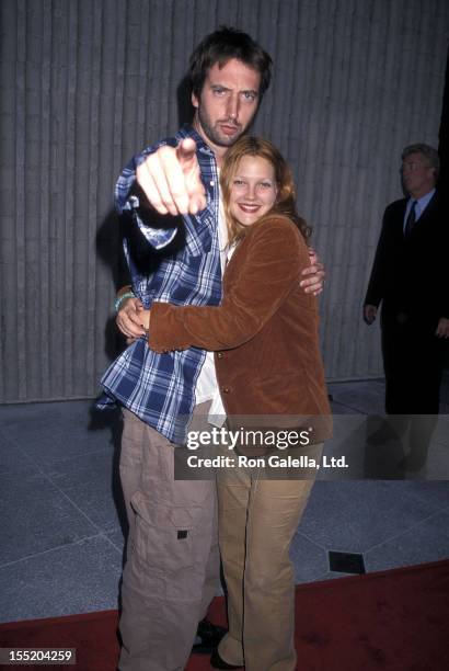 Comedian Tom Green and actress Drew Barrymore attend the "Loser" Westwood Premiere on July 20, 2000 at Avco Center Cinemas in Westwood, California.