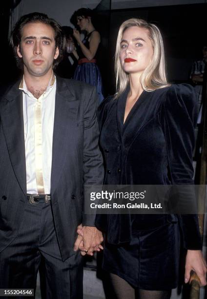 Actor Nicolas Cage and girlfriend Christina Fulton attend Michael Dukakis' Presidential Campaign Fundraiser Party on October 10, 1988 at The Pallett...