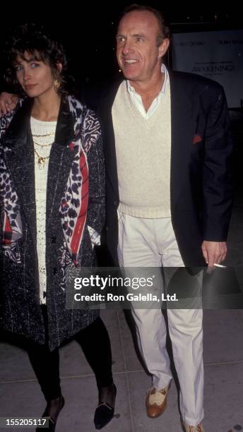 Actor James Caan and Ingrid Hajek attend the premiere of "Godfather III" on December 20, 1990 at the Academy Theater in Beverly Hills, California.